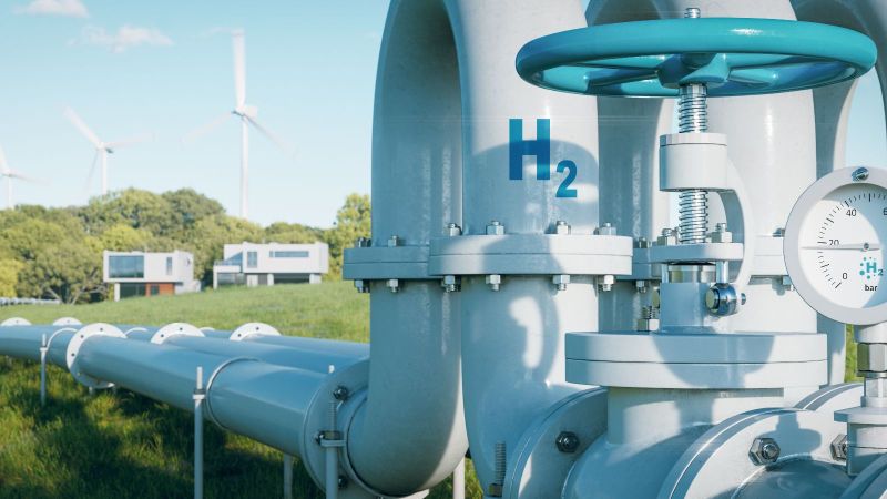 Eine Wasserstoffpipeline zu den Häusern veranschaulicht den Wandel des Energiesektors hin zu sauberen, kohlenstoffneutralen, sicheren und unabhängigen Energiequellen als Ersatz für Erdgas in den Haushalten.